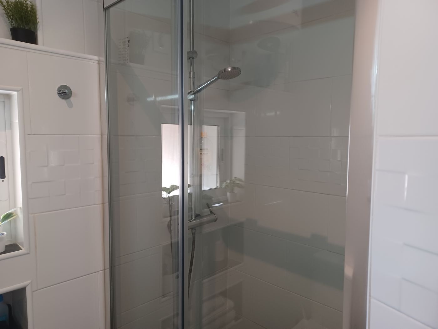 Bathroom with a glass walk-in shower